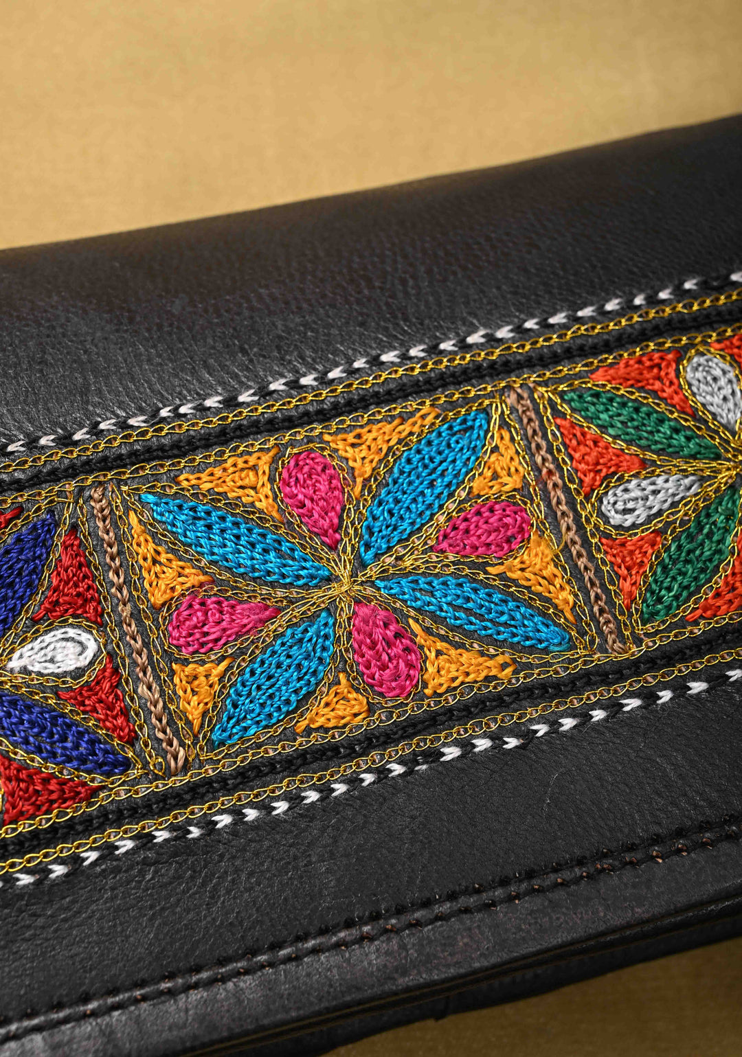Hand-Crafted And Floral Embroidery Leather Sling Bag in Black