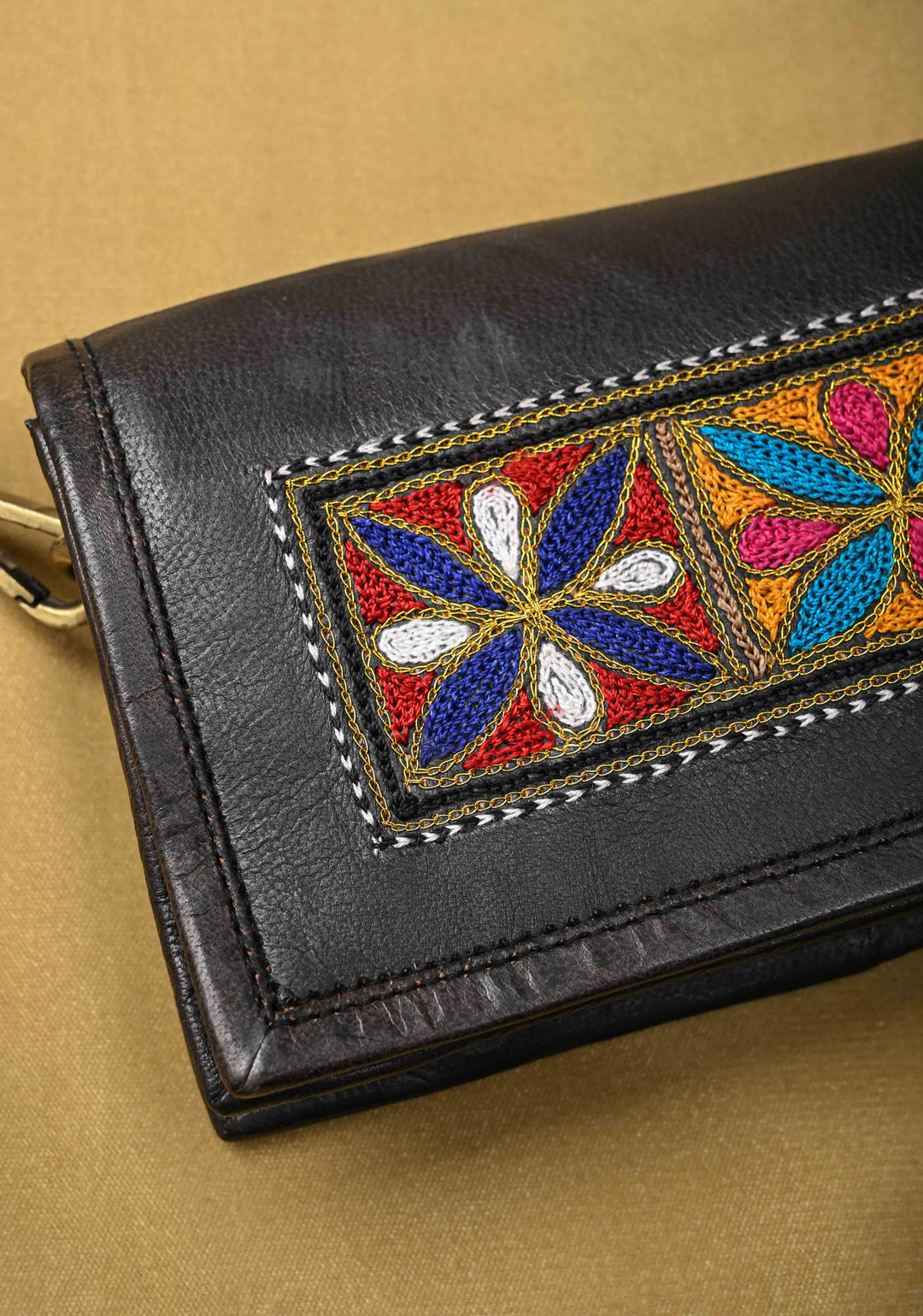 Hand-Crafted And Floral Embroidery Leather Sling Bag in Black