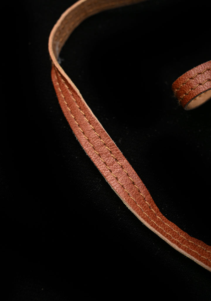 Brown Leather Hand-Crafted And Embroidery Potli Sling Bag with Aari Work