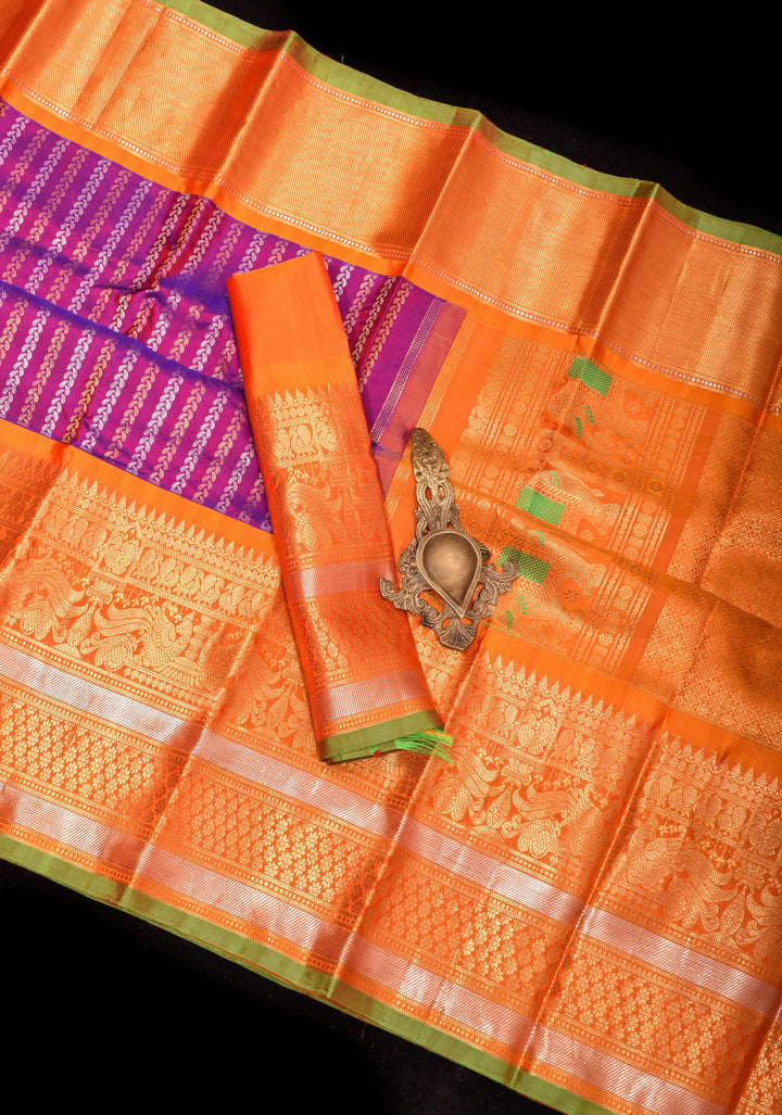 Pure Gadwal Silk Saree in Purple Blue Dual Tone with Ornate Zari Stripes and contrasting Orange Wide Border | SILK MARK CERTIFIED