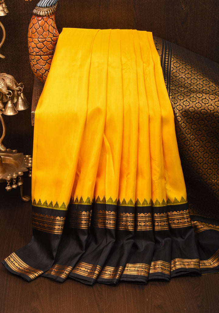 Yellow Exquisite Korvai Gadwal Silk Saree with Black  Borders | SILK MARK CERTIFIED