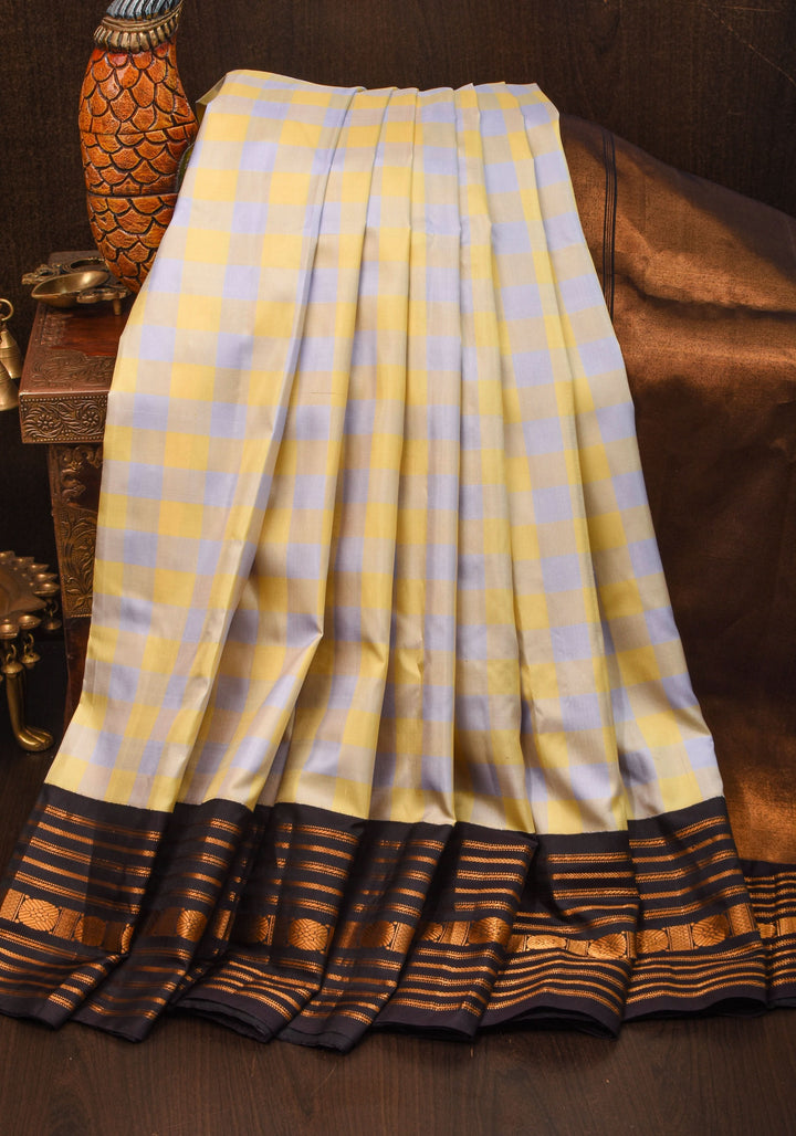 Checks with Korvai Border Gadwal Pure Silk Saree in Butter Yellow and Heather Gray  | SILK MARK CERTIFIED