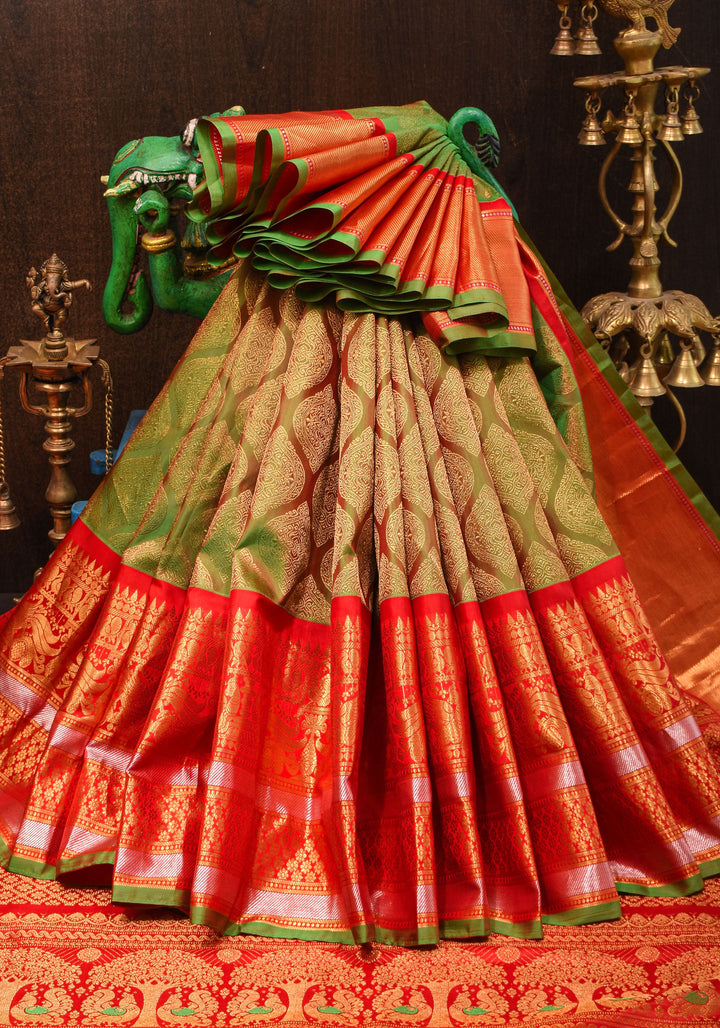 Exquisite Pure Gadwal Silk Saree in Henna Green dual tone  brocade with Contrast Red border and meenakari pallu| SILK MARK CERTIFIED