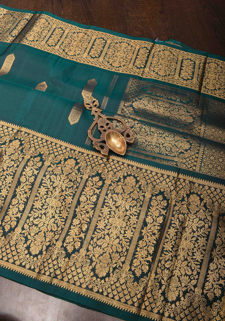 Stunning Dark Teal Pure handwoven Gadwal Silk Saree with Grand Pallu and Ornate Arches Zari Border | SILK MARK CERTIFIED