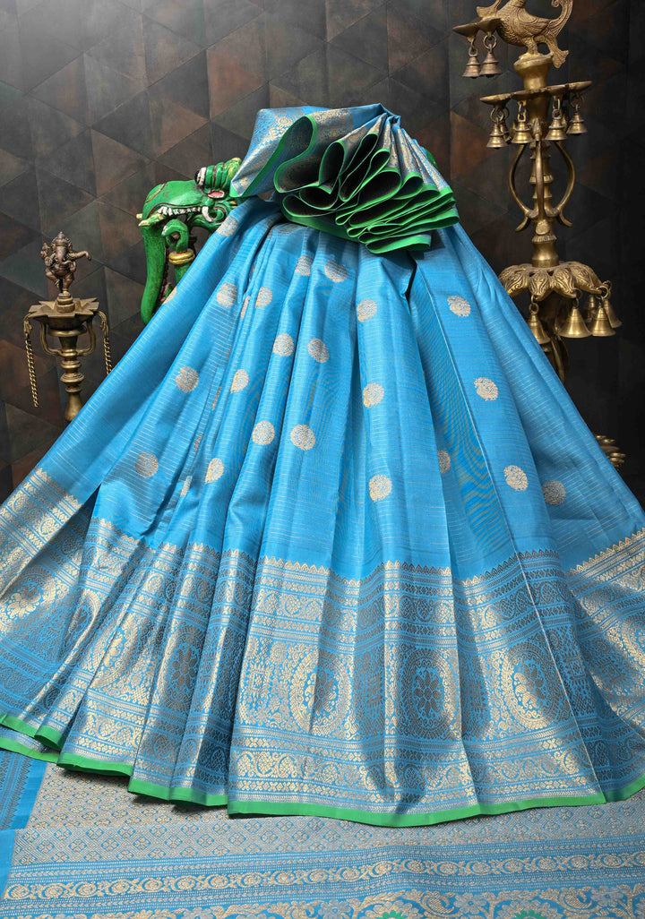 Chlorine Blue Gadwal Silk Saree With Horizontal Zari Stripes, Zari Buttas And Wide Floral Zari Border | SILK MARK CERTIFIED