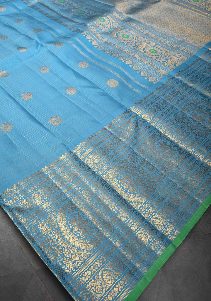 Chlorine Blue Gadwal Silk Saree With Horizontal Zari Stripes, Zari Buttas And Wide Floral Zari Border | SILK MARK CERTIFIED