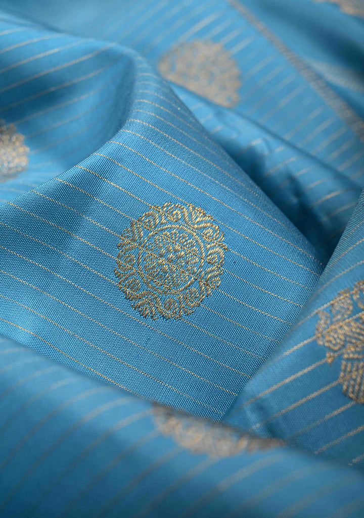 Chlorine Blue Gadwal Silk Saree With Horizontal Zari Stripes, Zari Buttas And Wide Floral Zari Border | SILK MARK CERTIFIED