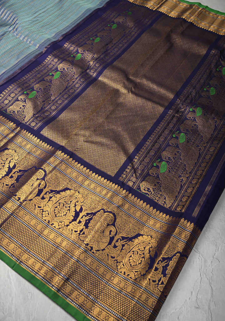 Pastel Blue Pure Gadwal Silk Saree with Ornate Zari Stripes and 12" Contrast Zari Border | SILK MARK CERTIFIED