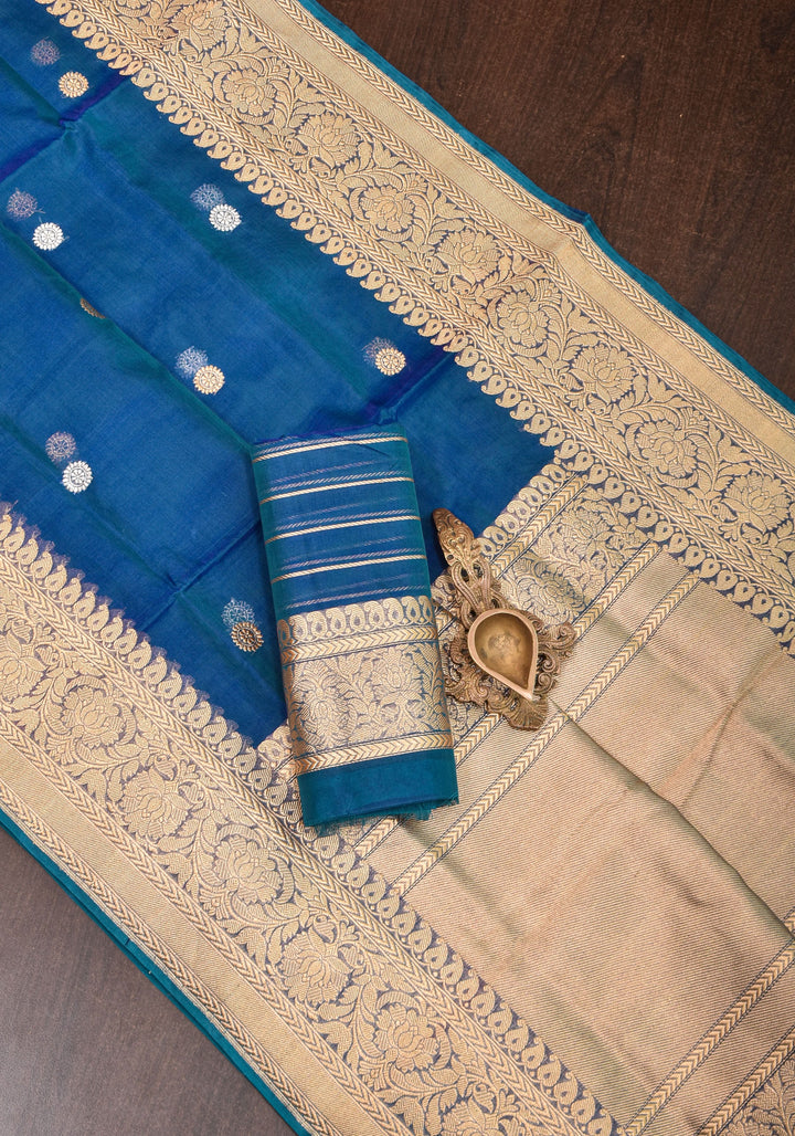 Exquisite Pure Banarasi Kora Silk Saree in Prussian Blue Dual Tone with Sona Rupa Buttas and Zari Border | SILK MARK CERTIFIED