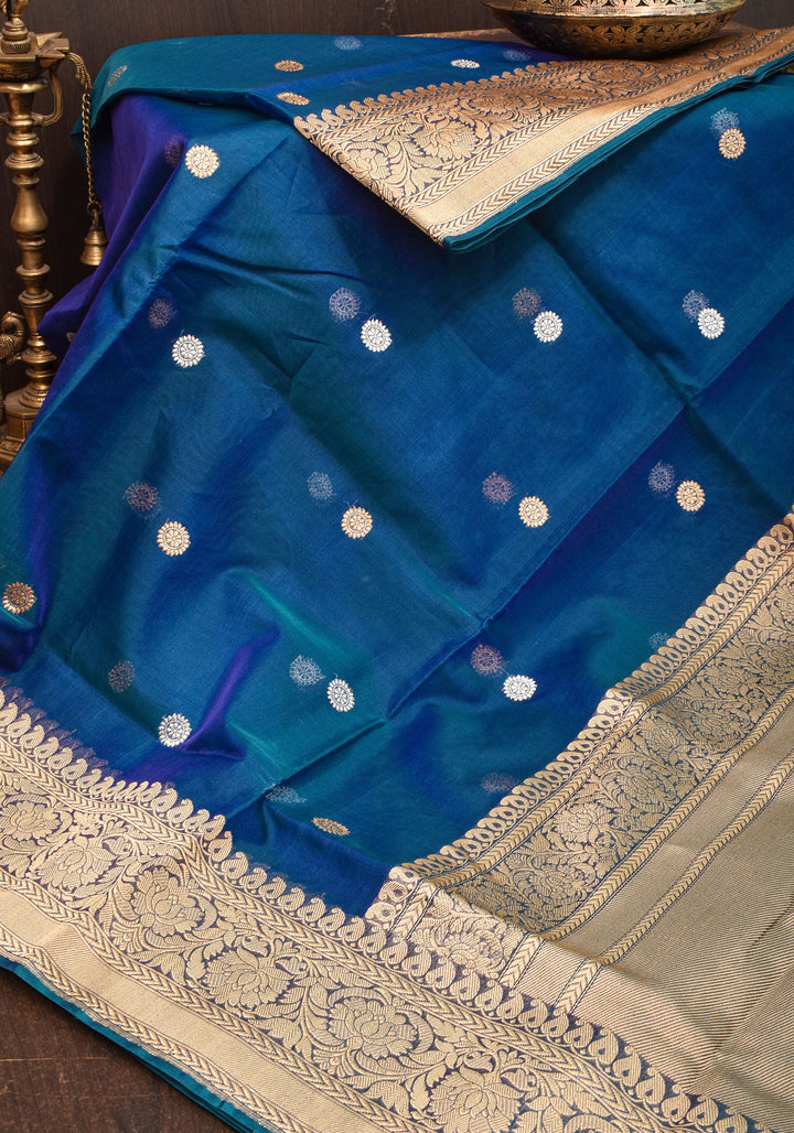 Exquisite Pure Banarasi Kora Silk Saree in Prussian Blue Dual Tone with Sona Rupa Buttas and Zari Border | SILK MARK CERTIFIED