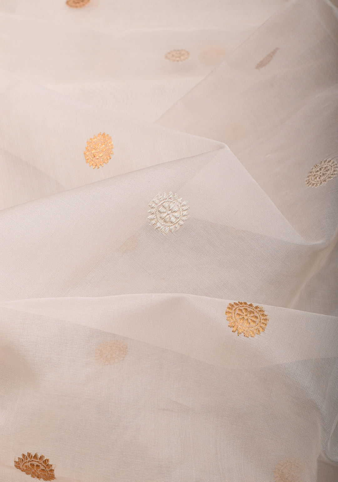 Exquisite Off White Banarasi Kora Silk Saree with Zari Motifs with kadhuwa weave, Grand Pallu and Zari | SILK MARK CERTIFIED | SHOBITAM