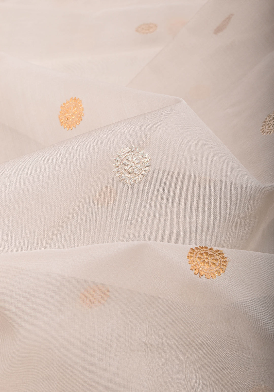 Exquisite Off White Banarasi Kora Silk Saree with Zari Motifs with kadhuwa weave, Grand Pallu and Zari | SILK MARK CERTIFIED | SHOBITAM