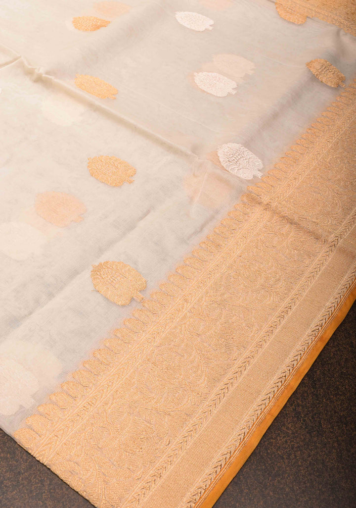Off White Banarasi Kora Silk Saree with Sona Rupa Buttas and Mango yellow Zari Border | SILK MARK CERTIFIED