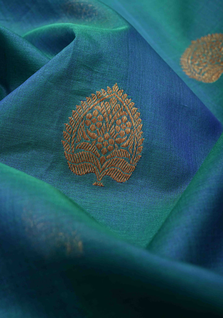 Exquisite Banarasi Kora Silk Saree with antique Zari Motifs and Border in Peacock blue And Green Dual Tone  | SILK MARK CERTIFIED
