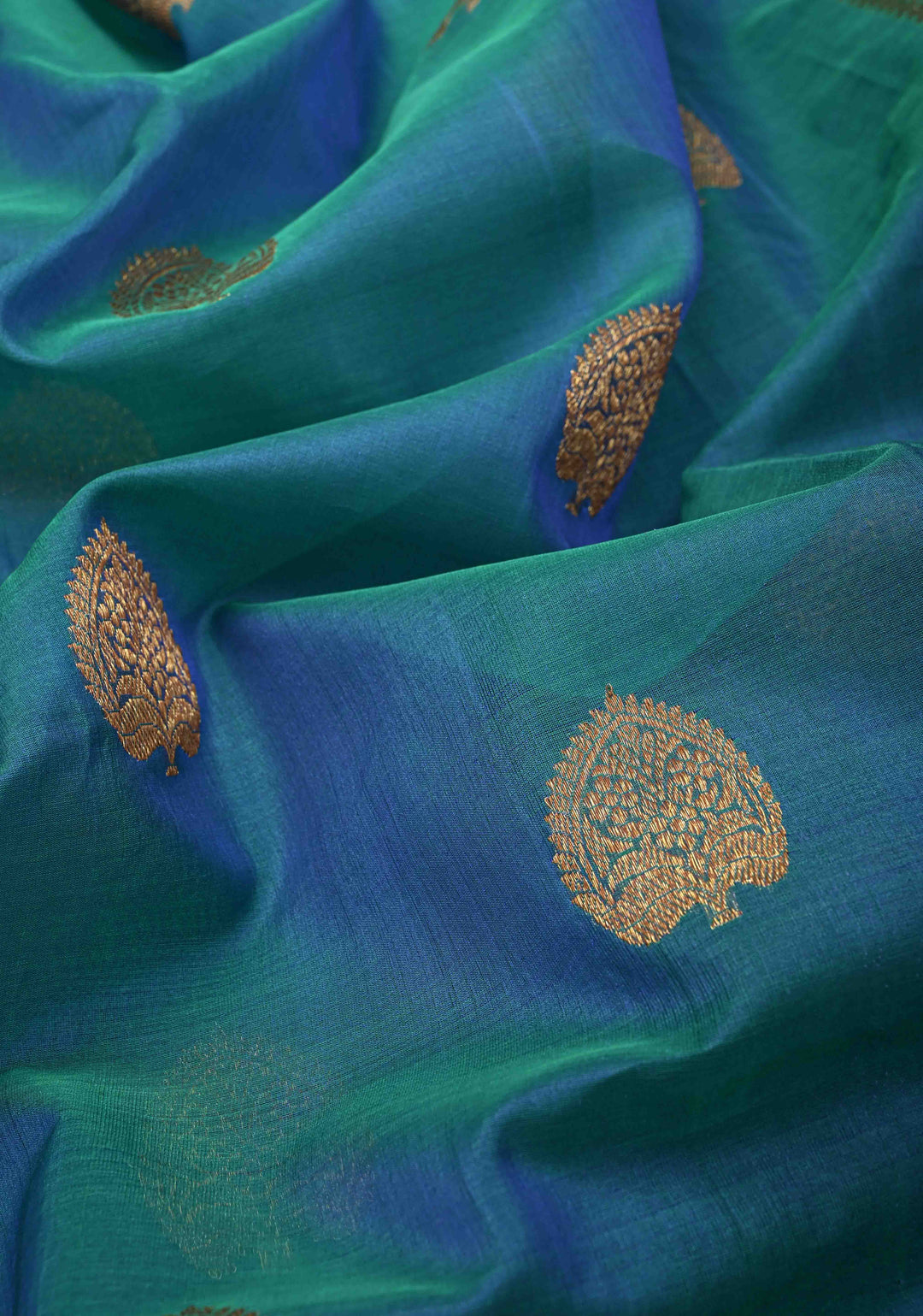Exquisite Banarasi Kora Silk Saree with antique Zari Motifs and Border in Peacock blue And Green Dual Tone  | SILK MARK CERTIFIED