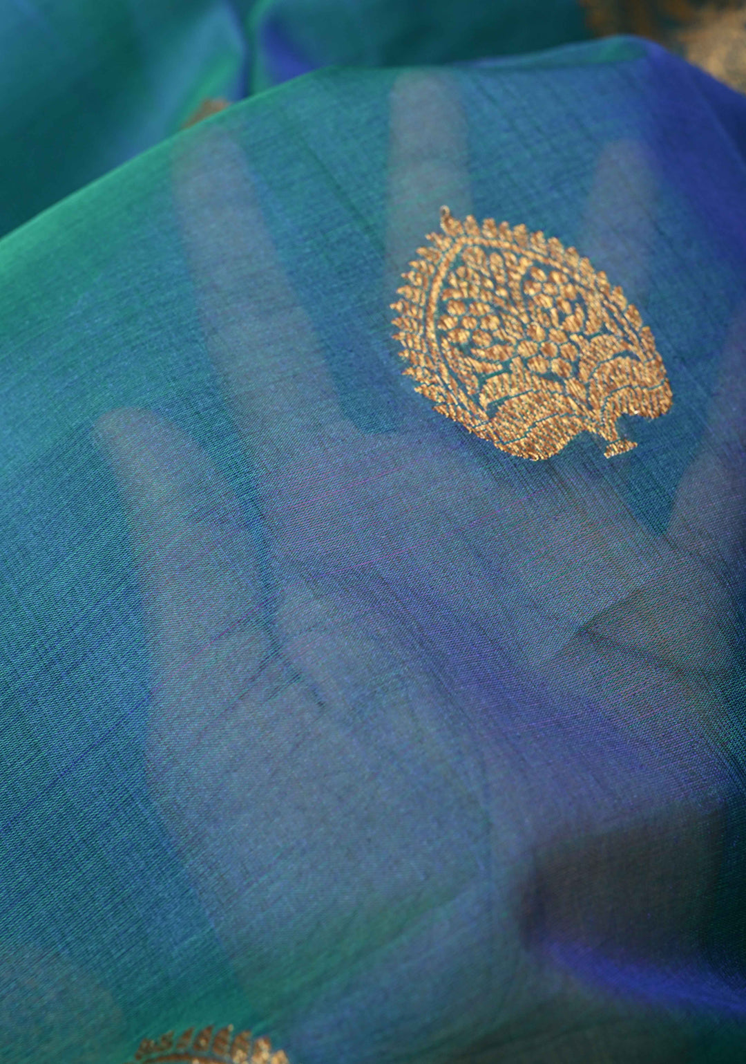 Exquisite Banarasi Kora Silk Saree with antique Zari Motifs and Border in Peacock blue And Green Dual Tone  | SILK MARK CERTIFIED
