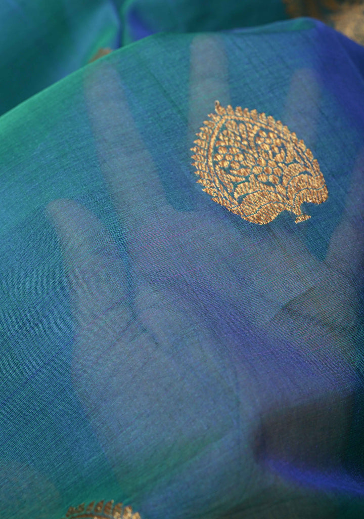 Exquisite Banarasi Kora Silk Saree with antique Zari Motifs and Border in Peacock blue And Green Dual Tone  | SILK MARK CERTIFIED