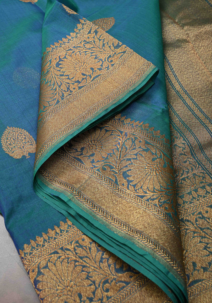 Exquisite Banarasi Kora Silk Saree with antique Zari Motifs and Border in Peacock blue And Green Dual Tone  | SILK MARK CERTIFIED