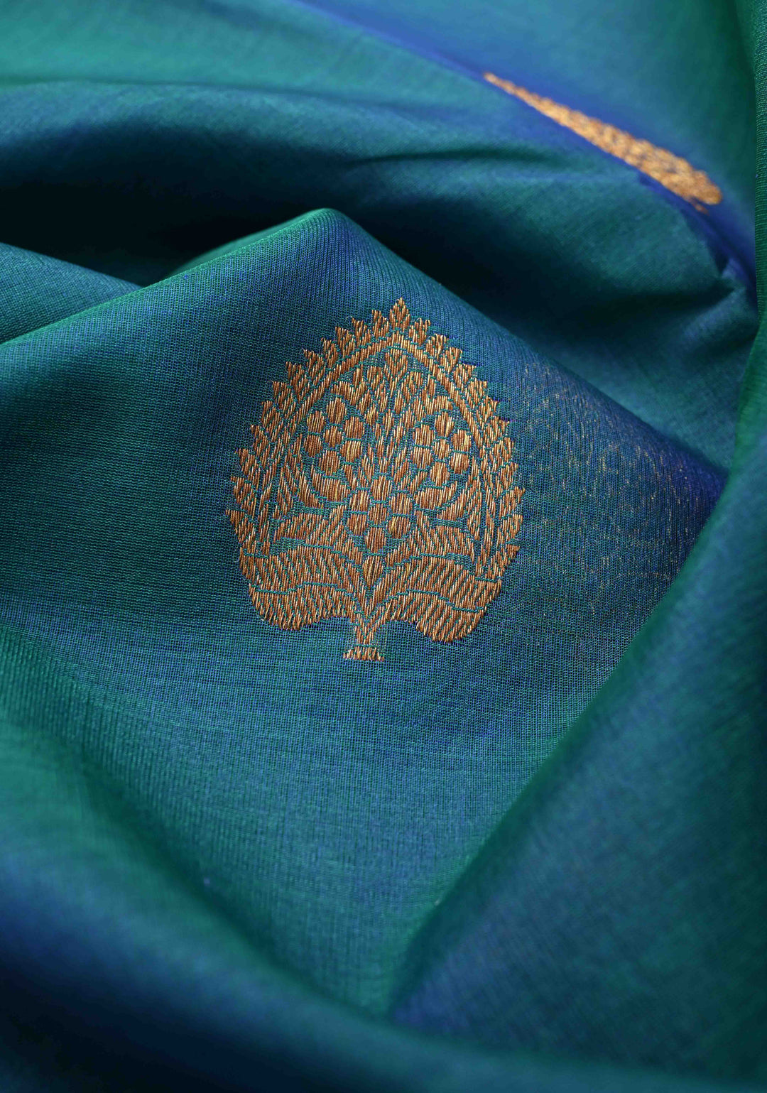 Exquisite Banarasi Kora Silk Saree with antique Zari Motifs and Border in Peacock blue And Green Dual Tone  | SILK MARK CERTIFIED
