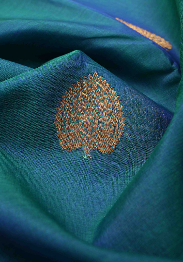 Exquisite Banarasi Kora Silk Saree with antique Zari Motifs and Border in Peacock blue And Green Dual Tone  | SILK MARK CERTIFIED