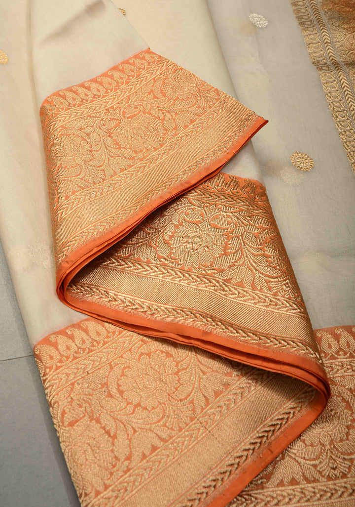 Cream Banarasi Kora Silk Saree with Sona Rupa Buttas and Contrast Zari Border | SILK MARK CERTIFIED | SHOBITAM