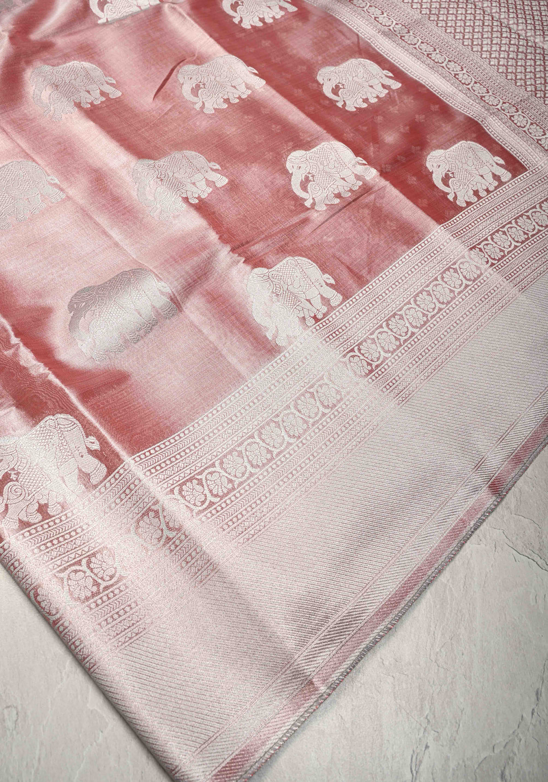 Dusty Rose Kanchi Tissue Semi Silk Saree with Silver Elephant Buttas with and Silver Zari Border