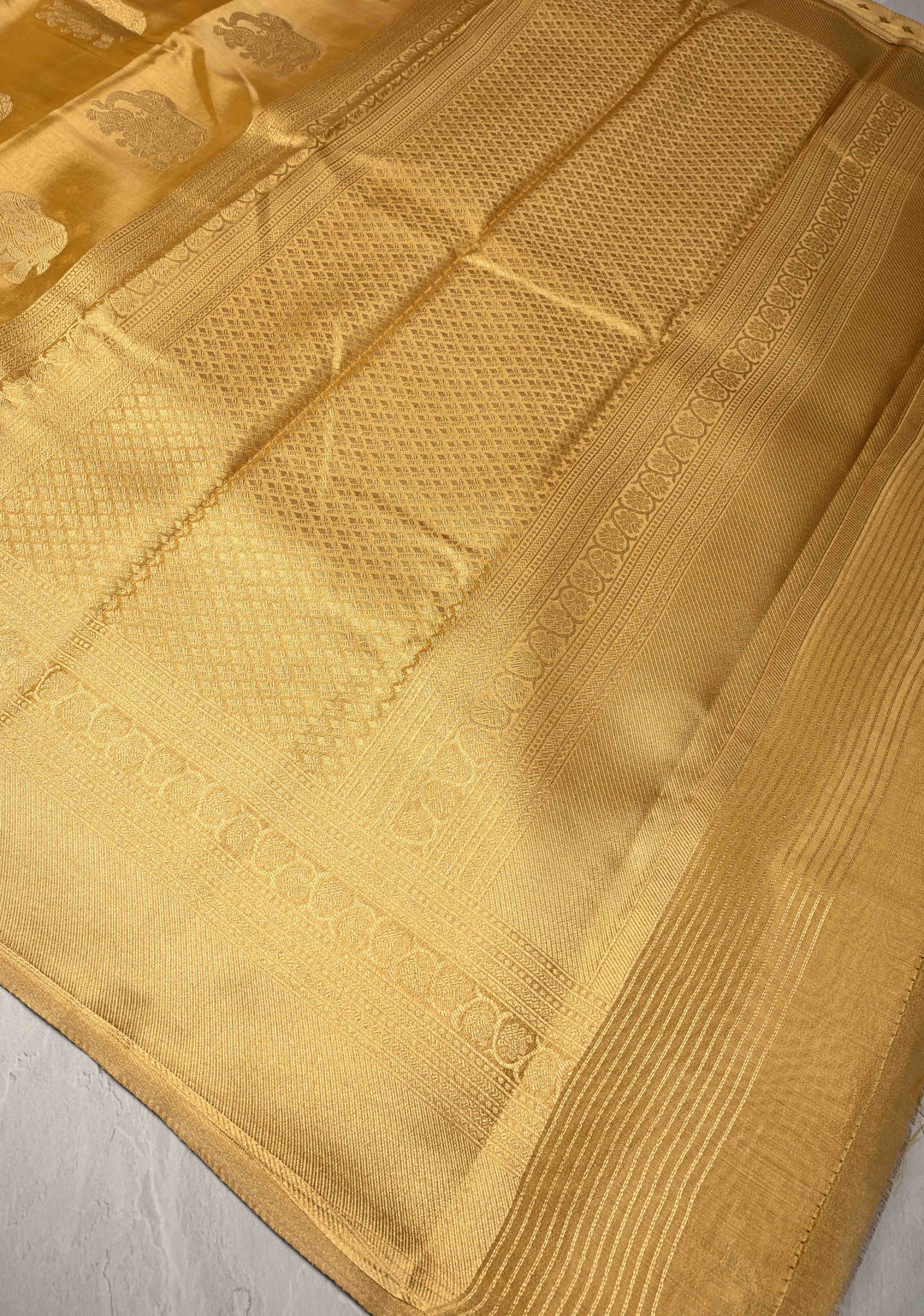 Gold Kanchi Tissue Semi Silk Saree with Elephant Buttas with and Zari Border