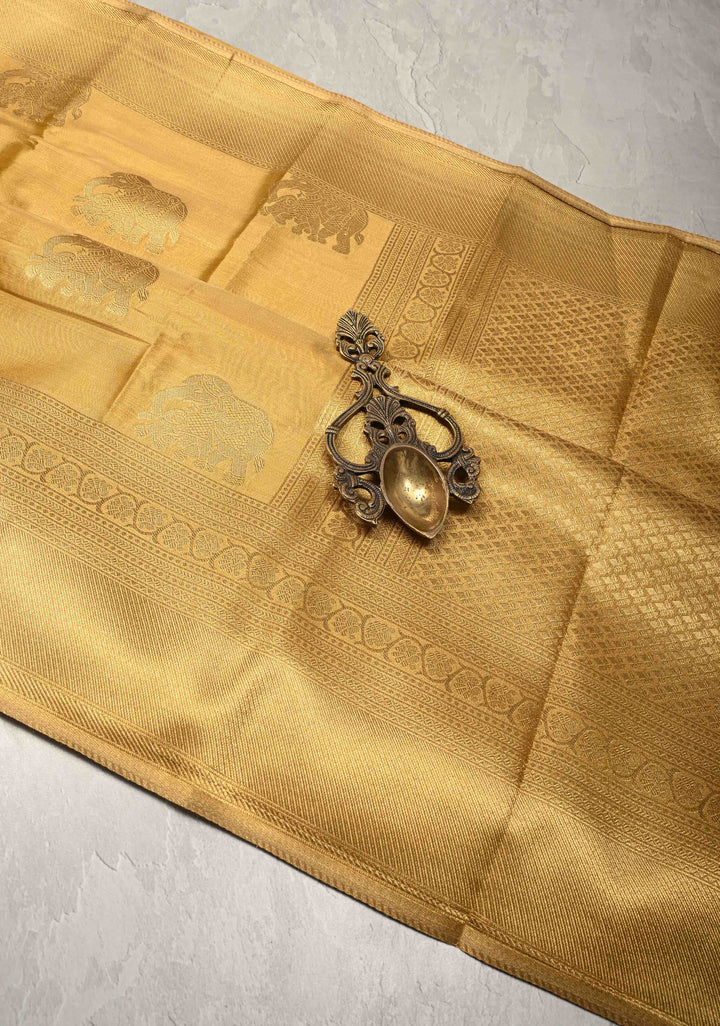 Gold Kanchi Tissue Semi Silk Saree with Elephant Buttas with and Zari Border
