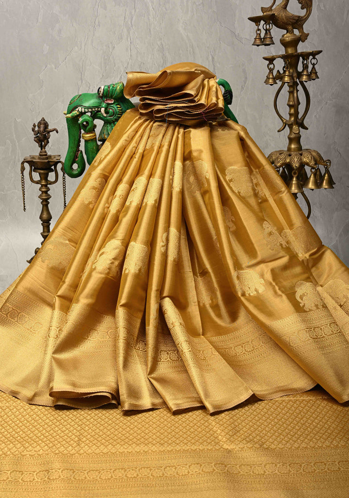 Gold Kanchi Tissue Semi Silk Saree with Elephant Buttas with and Zari Border
