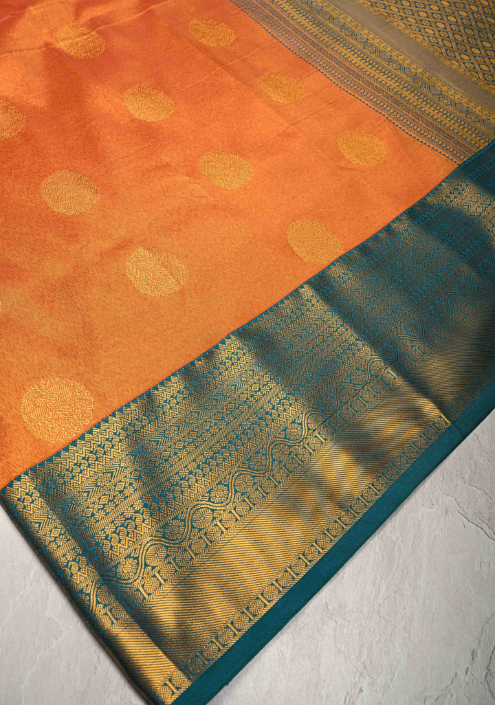 Dusty Orange Dual Tone Kanchi Tissue Semi Silk Saree with Peacock Buttas and Contrast Zari Border
