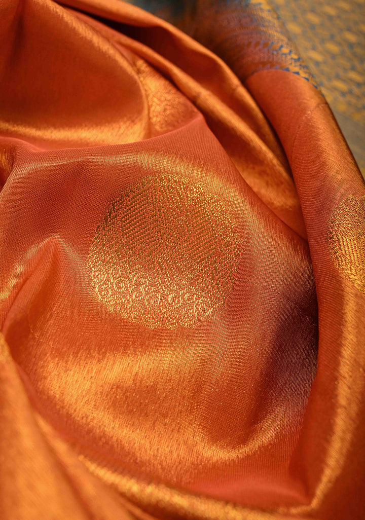 Dusty Orange Dual Tone Kanchi Tissue Semi Silk Saree with Peacock Buttas and Contrast Zari Border