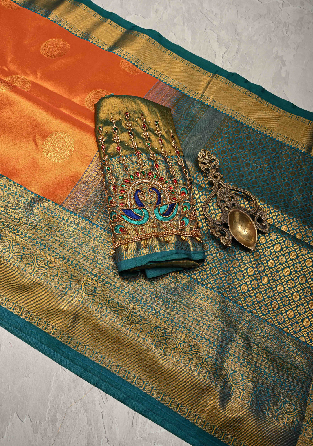 Dusty Orange Dual Tone Kanchi Tissue Semi Silk Saree with Peacock Buttas and Contrast Zari Border