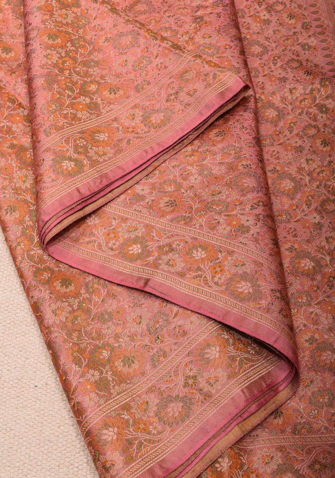 Delicate Pink Banarasi Silk Saree with Floral Patterns and Subtle Tassels| SILK MARK CERTIFIED