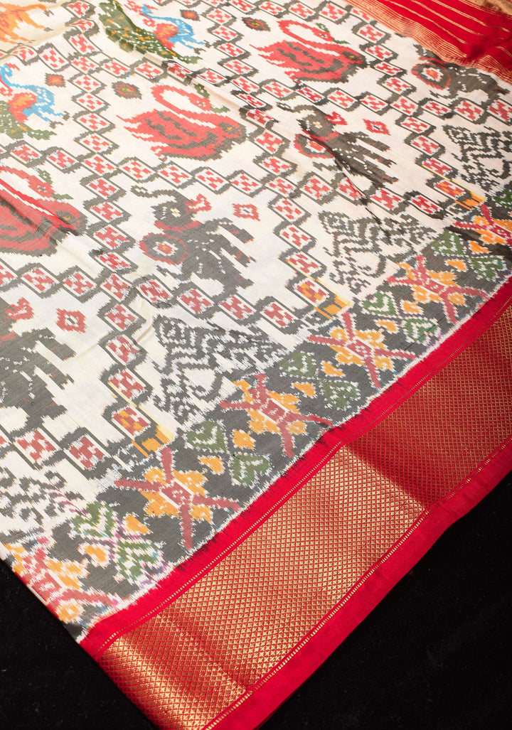 Ivory Ikkat Patola Kanjivaram Fusion Pure Silk Saree and Contrast Red Zari Border | SILK MARK CERTIFIED