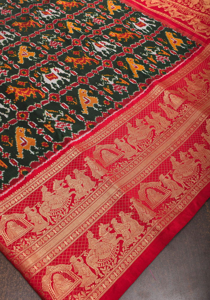Exquisite Ikkat Kanjivaram Fusion Silk Saree in Deep Green with Grand Pallu and Wide Zari Border | SILK MARK CERTIFIED