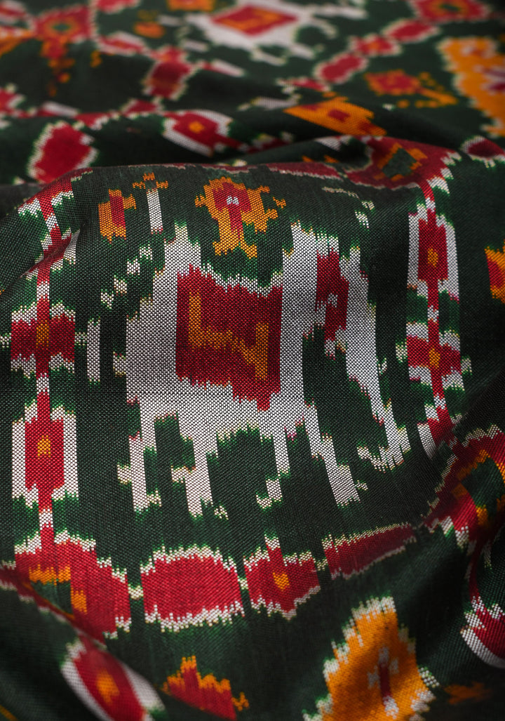 Exquisite Ikkat Kanjivaram Fusion Silk Saree in Deep Green with Grand Pallu and Wide Zari Border | SILK MARK CERTIFIED