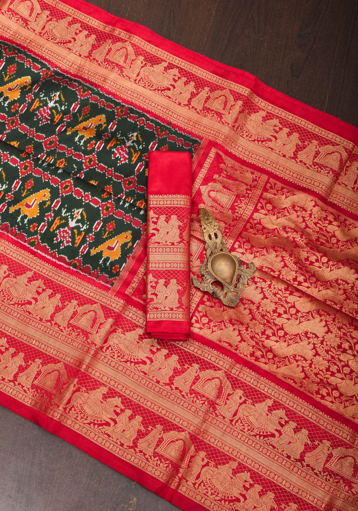 Exquisite Ikkat Kanjivaram Fusion Silk Saree in Deep Green with Grand Pallu and Wide Zari Border | SILK MARK CERTIFIED