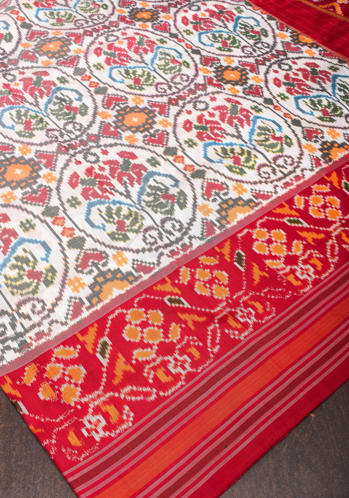 White Pure Silk Saree with Intricate Ikkat patterns and Contrast Red Border | SILK MARK CERTIFIED