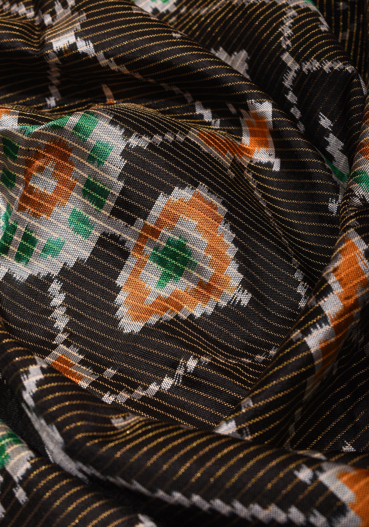 Dupatta : Black and Orange Ikkat Patola Design Pure Silk Dupatta with handmade tassels I SILK MARK CERTIFIED