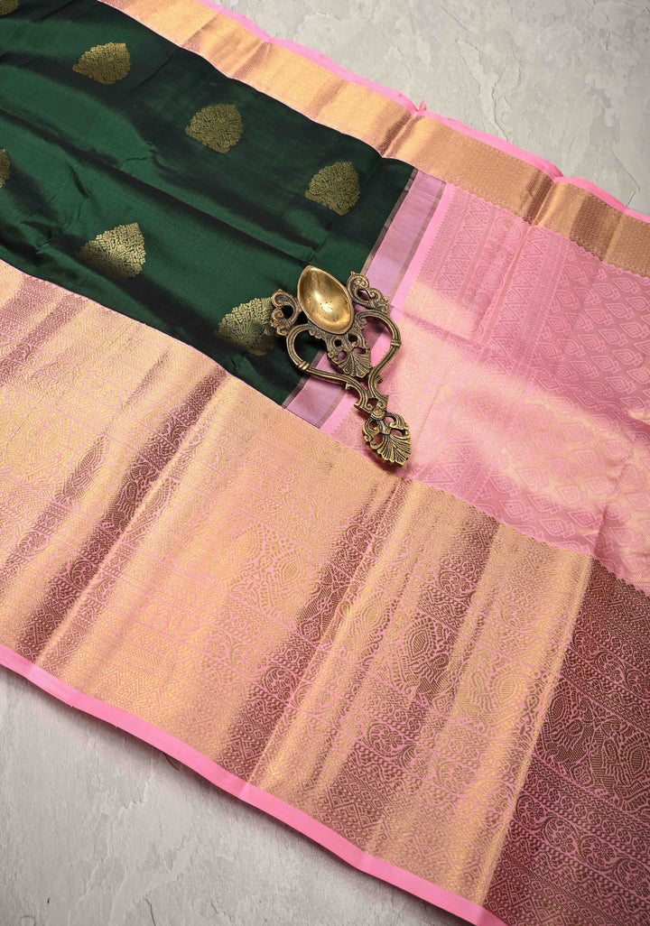 Bottle Green Kanjivaram Pure Silk Saree with Floral Zari Buttas and Contrast Wide Zari Border | SILK MARK CERTIFIED