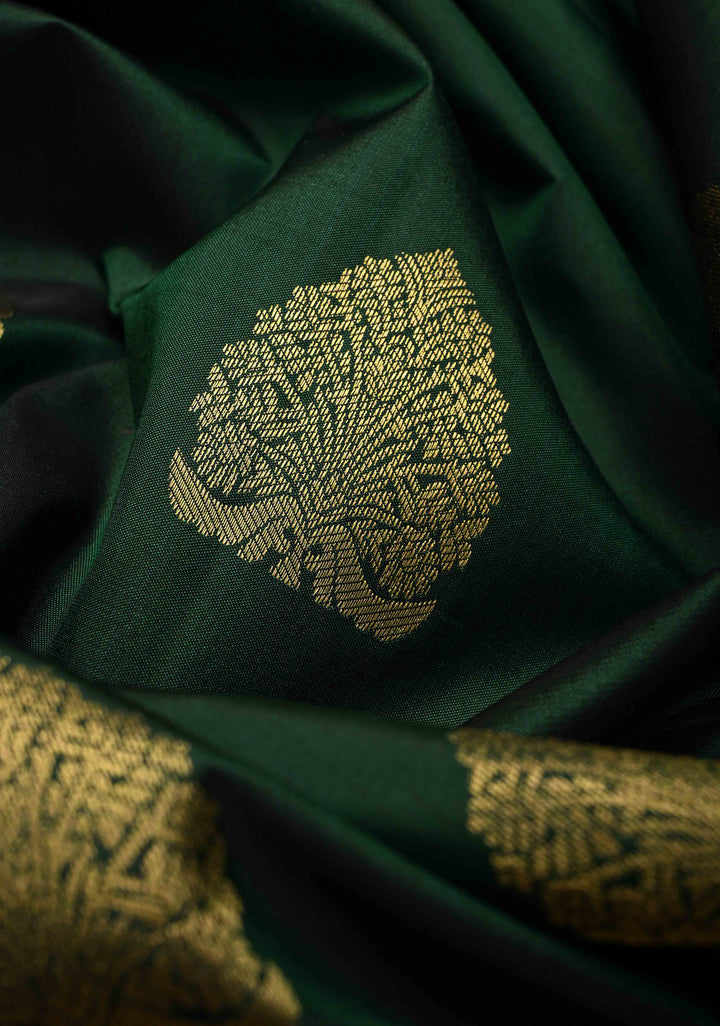 Bottle Green Kanjivaram Pure Silk Saree with Floral Zari Buttas and Contrast Wide Zari Border | SILK MARK CERTIFIED