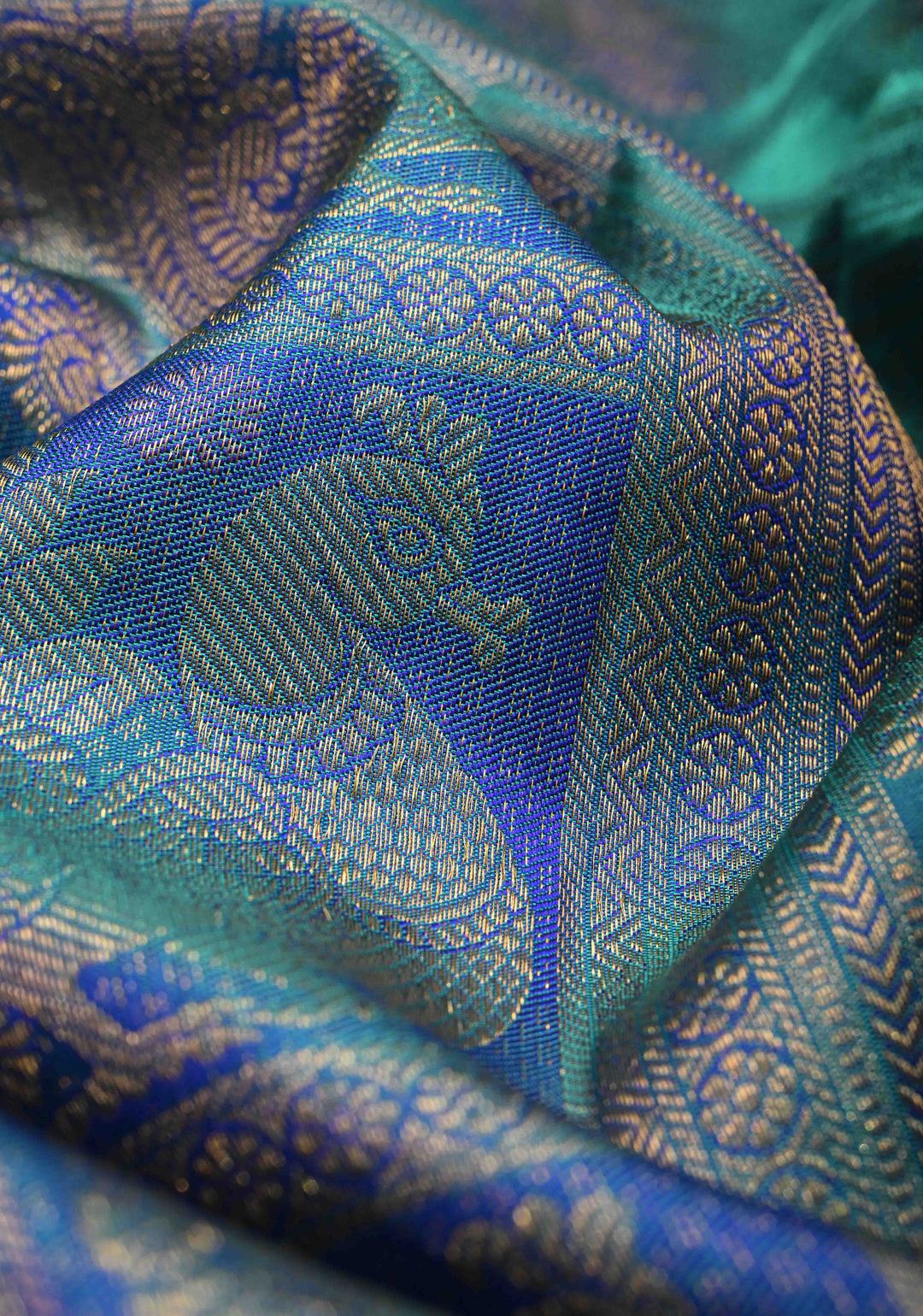 Turquoise Blue Kanjivaram Pure Silk Saree with Patola Design Contrast Purple Zari Border | SILK MARK CERTIFIED