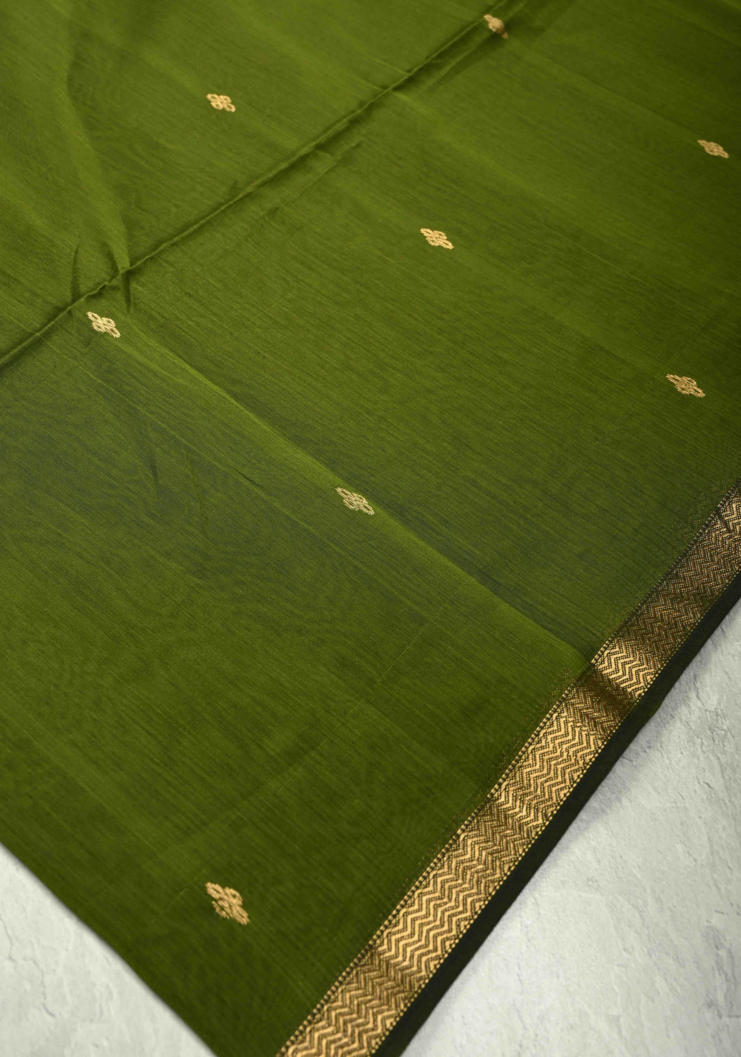 Olive Green Handwoven maheswari cotton silk saree with Zari Buttas and MInimal Border