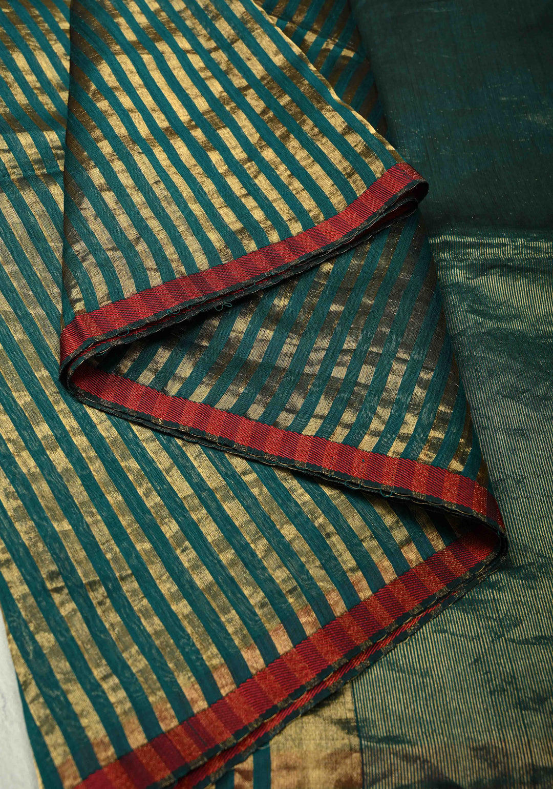 Green Handwoven Maheshwari Tissue Silk Cotton Saree with Vertical Stripes and Minimal Zari Borders