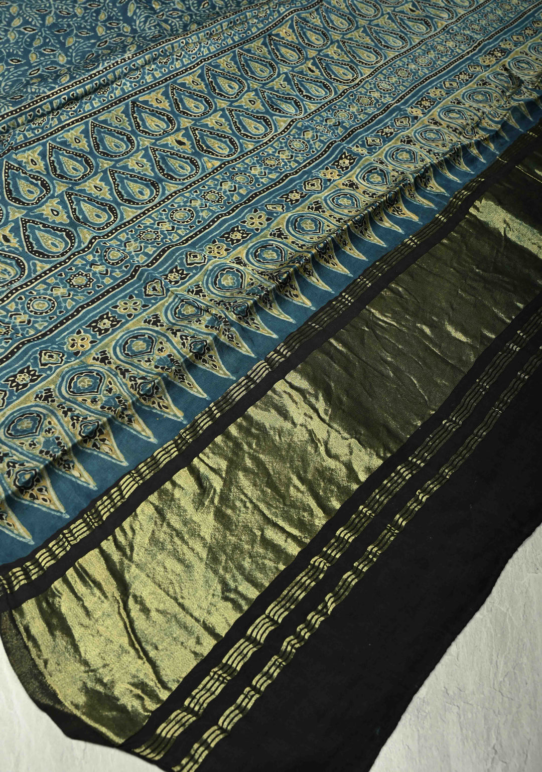 Dupatta: Indigo Pure modal silk dupatta with Ajrakh hand block print and lagda patta