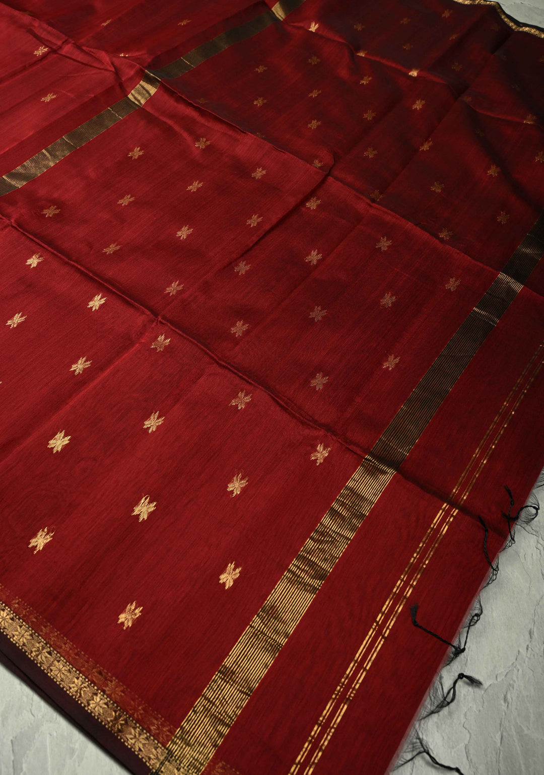 Maroon Handwoven Maheswari Silk Cotton Saree with Zari Buttas and Minimal Zari Border
