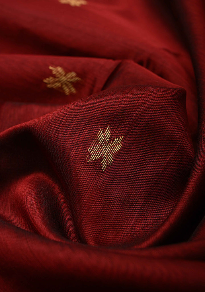 Maroon Handwoven Maheswari Silk Cotton Saree with Zari Buttas and Minimal Zari Border