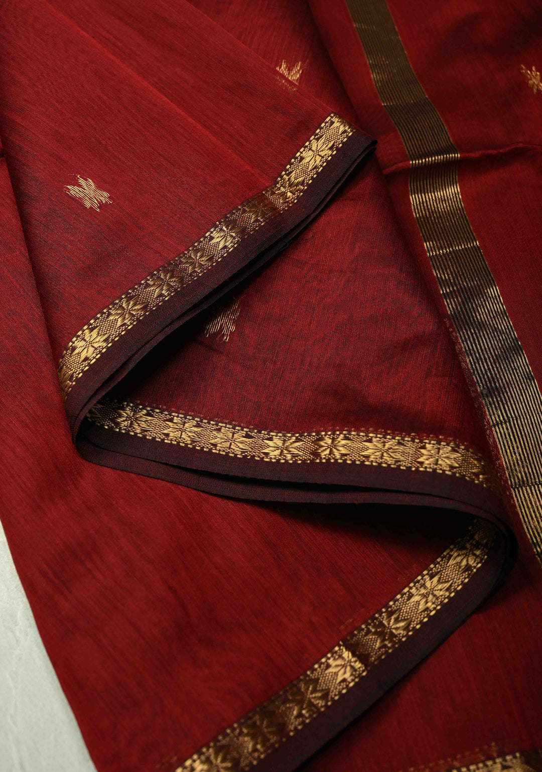 Maroon Handwoven Maheswari Silk Cotton Saree with Zari Buttas and Minimal Zari Border