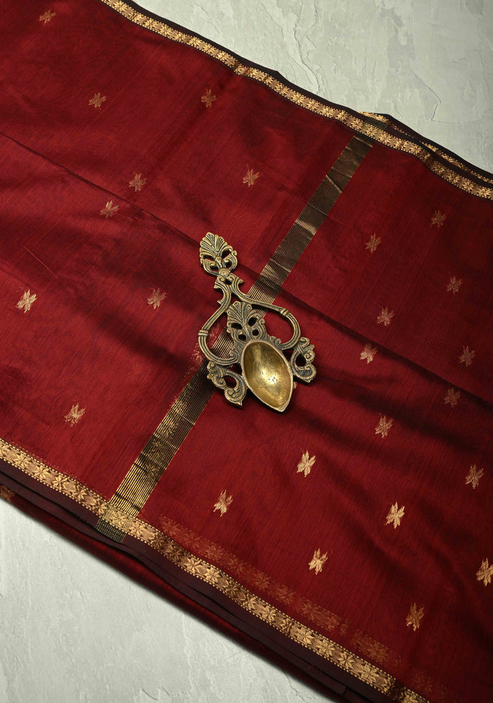 Maroon Handwoven Maheswari Silk Cotton Saree with Zari Buttas and Minimal Zari Border