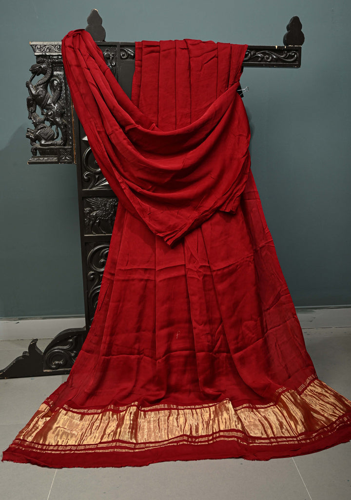 Maroon Borderless Modal Silk Saree with Lagda Patta Crushed Tissue Pallu | SHOBITAM